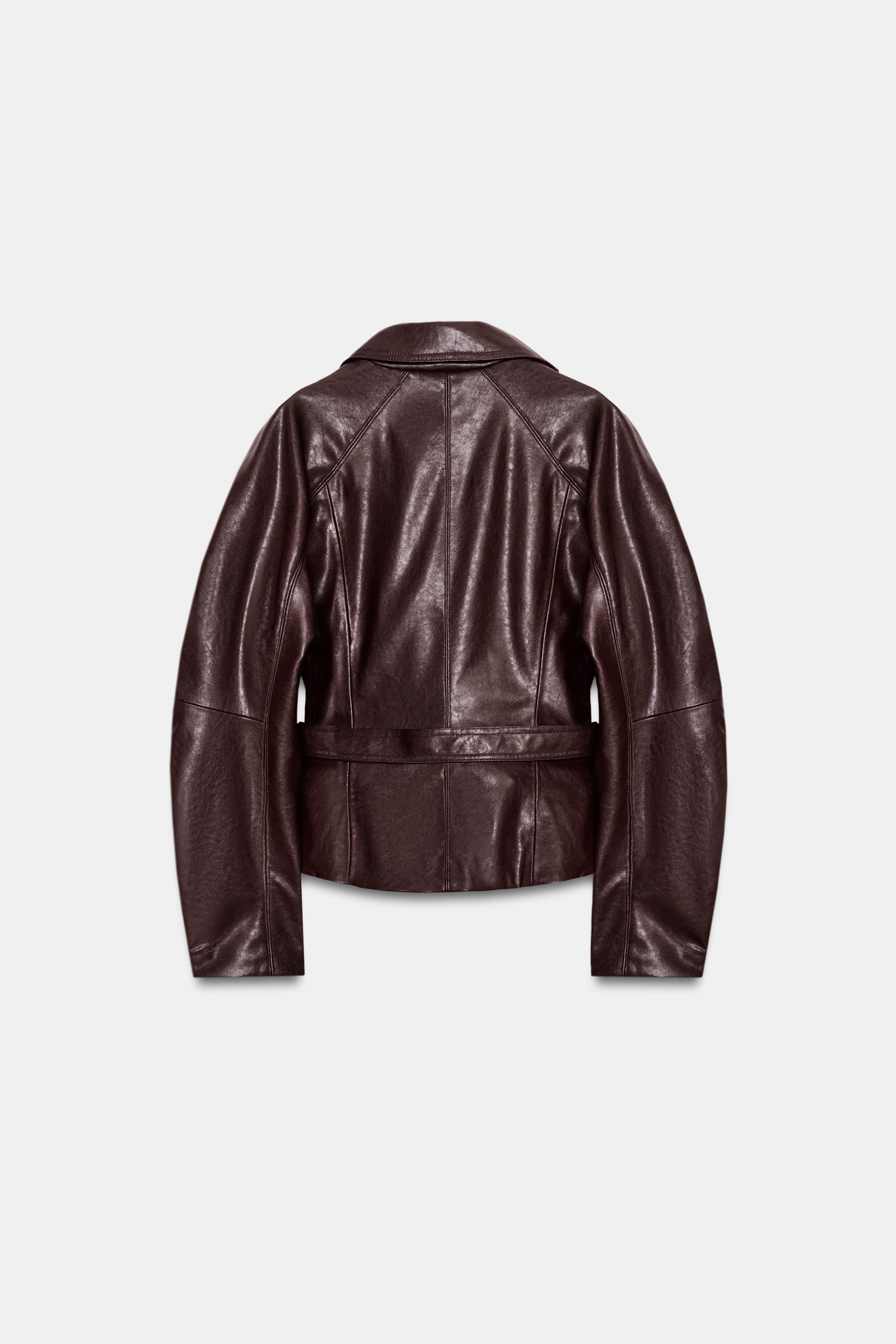 VESTE À CEINTURE EN MATIÈRE SYNTHÉTIQUE
